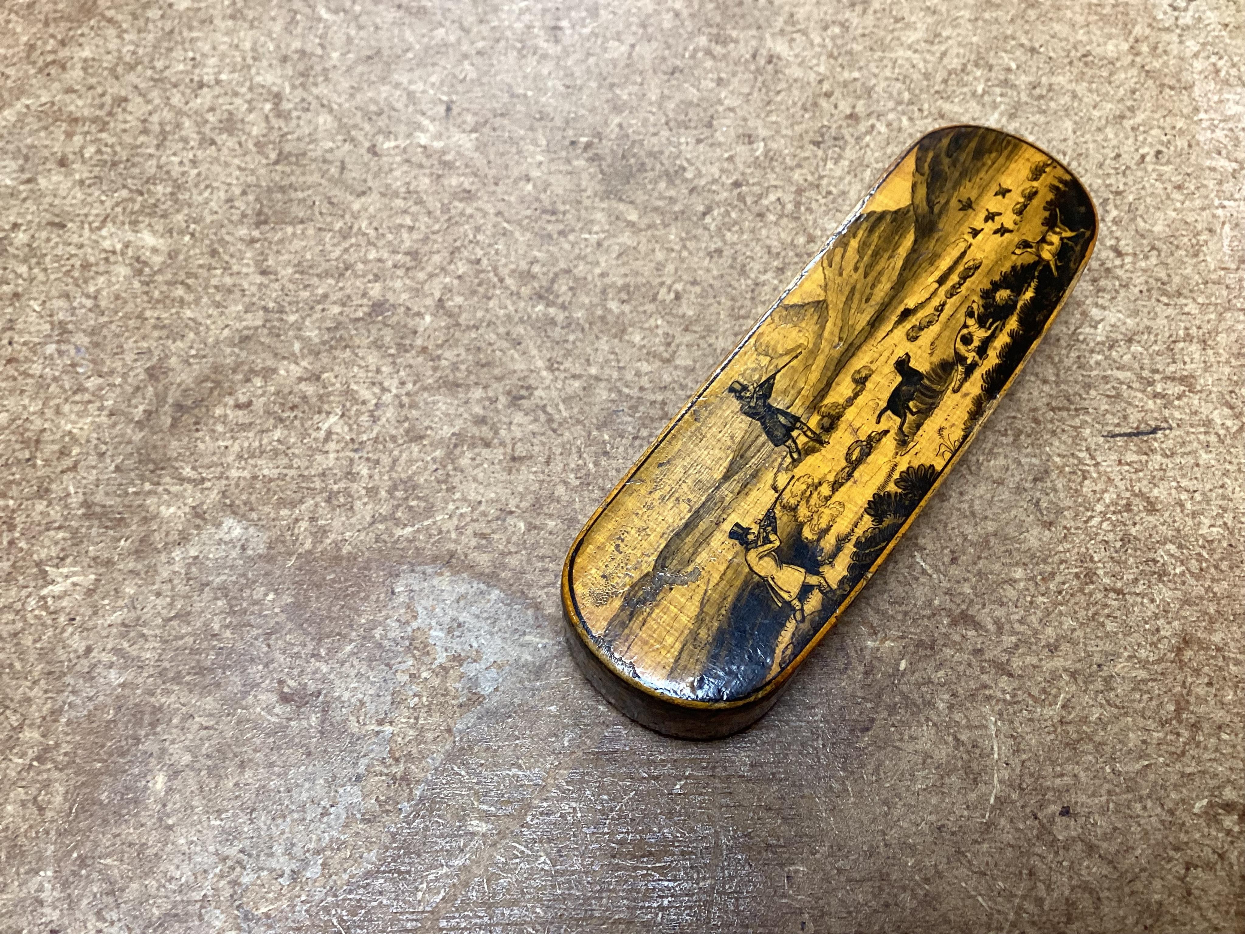 An early Mauchline ware penwork 'hunting' toothpick case, 7cm in length